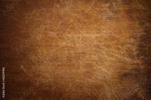 Fotografering Old grunge wooden cutting kitchen board background
