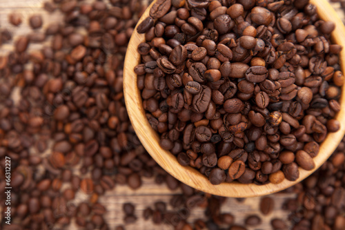 Roasted coffee beans in a bowl