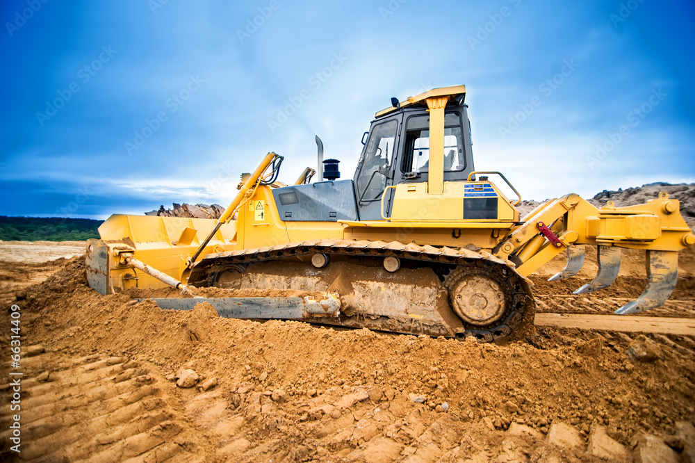 Excavator working and moving earth in construction site Excavator working and moving earth in construction site