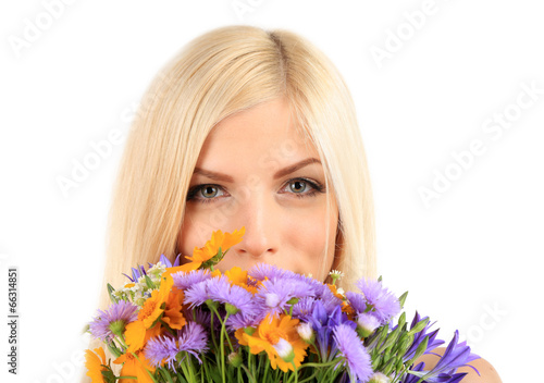 Young beautiful woman with flowers isolated on white