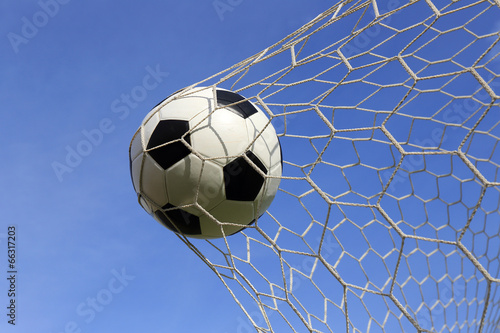 Socce in the goal net © kungverylucky