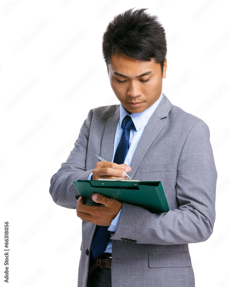 Business man write on clipboard Business man write on clipboard