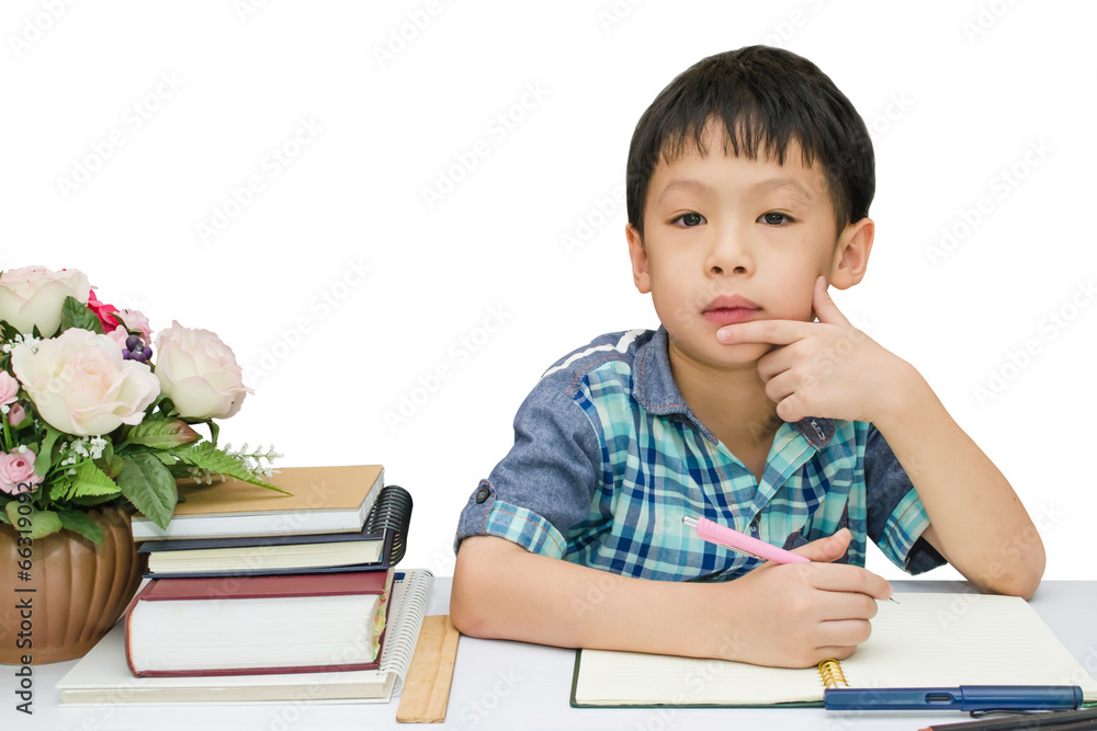 Student boy thinking between doing homework Student boy thinking between doing homework