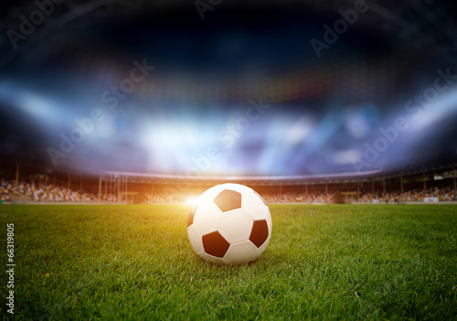 Soccer ball on the field of stadium © byrdyak