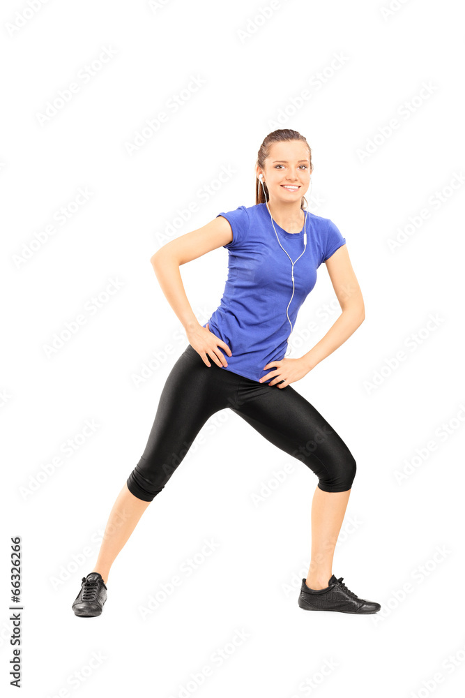 Woman listening to music and exercising
