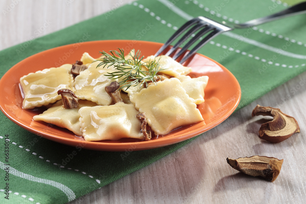 Portion of ravioli with mushrooms and sauerkraut Portion of ravioli with mushrooms and sauerkraut