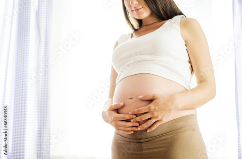 Free Download Pregnant woman at home - GFXLoad