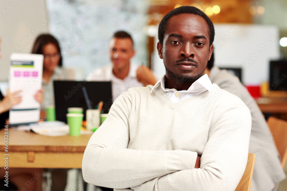 Portrait of a pensive businessman with arms folded Portrait of a pensive businessman with arms folded