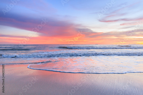Принти на полотні Water wave foam moving on pink sky Beach in summer season