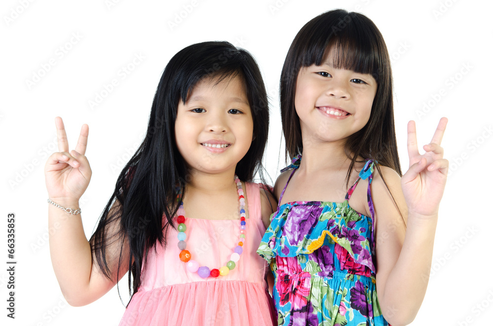 portrait of two asian happy sisters having fun portrait of two asian happy sisters having fun