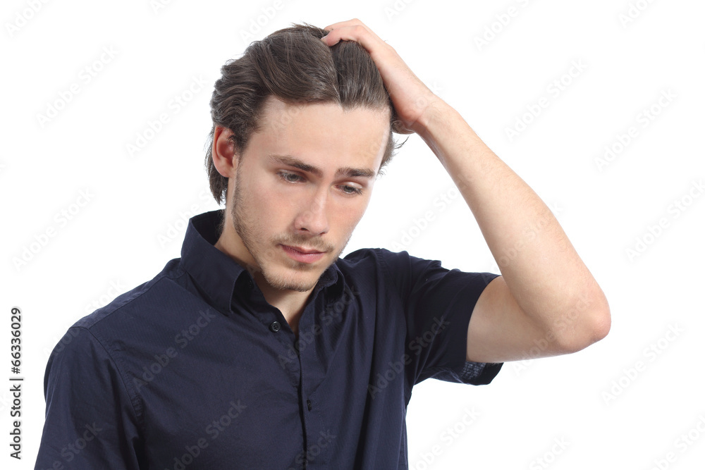 Worried depressed man with the hand on the head Worried depressed man with the hand on the head