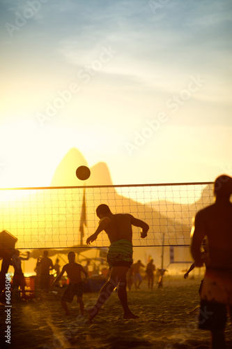 Brazilians Playing Beach Footvolley Rio de Janeiro Brazil Sunset