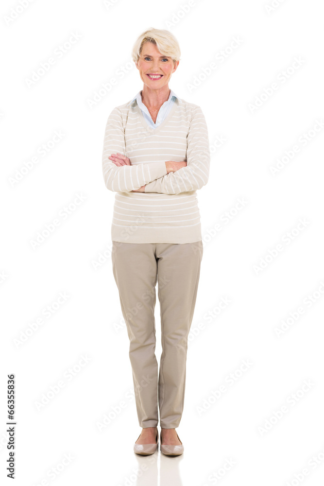 middle aged woman portrait with arms crossed middle aged woman portrait with arms crossed