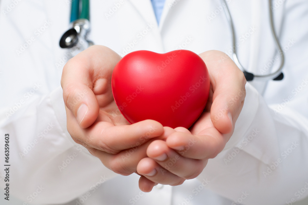 Doctor protecting a heart Doctor protecting a heart
