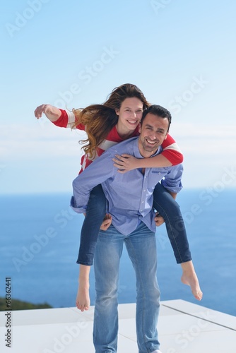 happy young romantic couple have fun relax