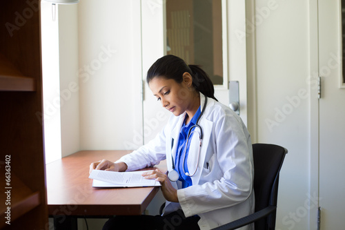 Healthcare professional reading
