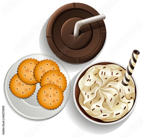 Drinks in disposable cups and a plate with biscuits