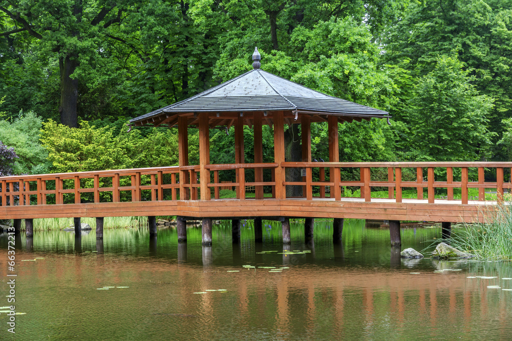 Red bridge with a view pavilion, yumedono bashi, in japanese gar