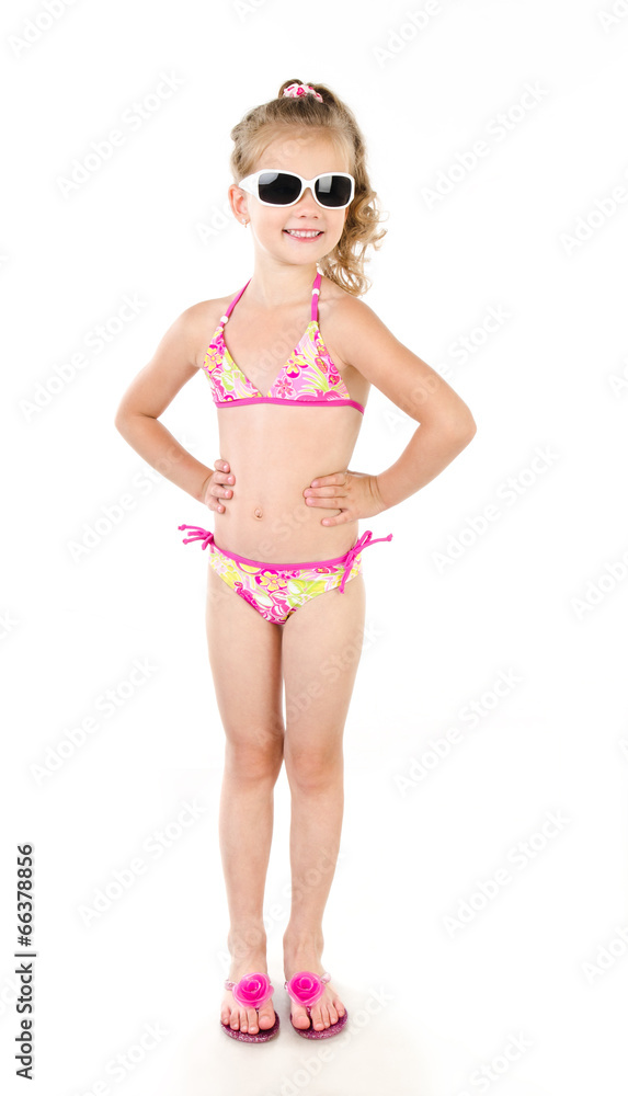 Cute smiling little girl in swimsuit isolated on a white Cute smiling little girl in swimsuit isolated on a white
