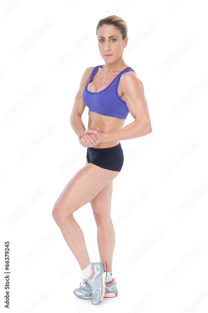 Strong blonde posing and looking at camera Strong blonde posing and looking at camera