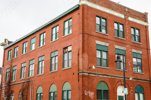 Old Brick Building with Green Windows