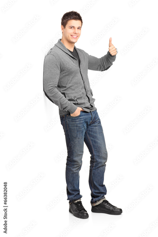 Male fashion model giving a thumb up Male fashion model giving a thumb up