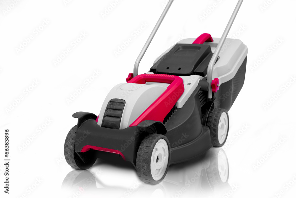 New lawn mower isolated on a white background New lawn mower isolated on a white background