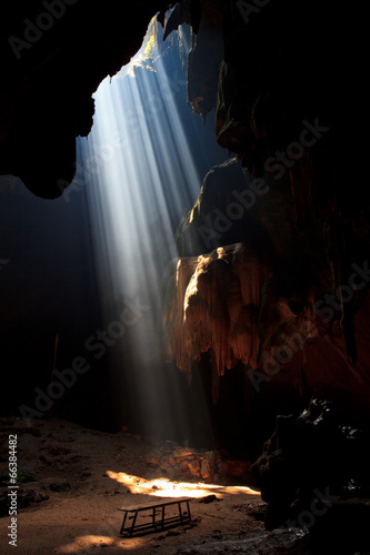 Canvas Print Sunbeam into the cave at the national park, Thailand