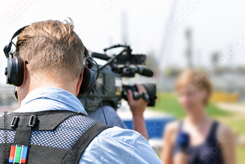 Billede på lærred Fernsehteam vor Ort bei Aufzeichnung
