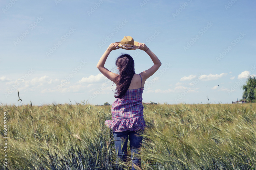 Girl in a wheat field