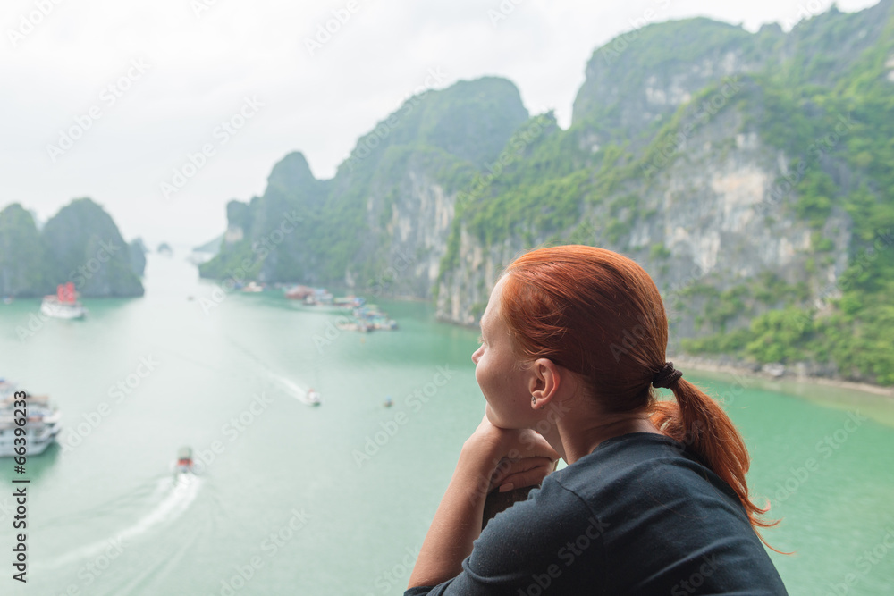 Young woman enjoying Halong bay view
