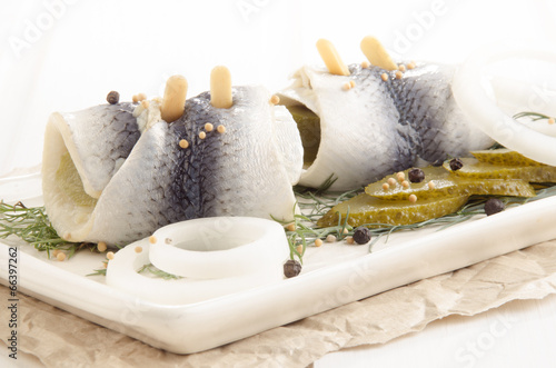 pickled herring with gherkin and onlion