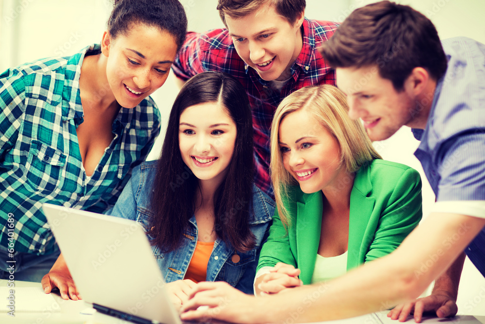 students looking at tablet pc in lecture at school students looking at tablet pc in lecture at school