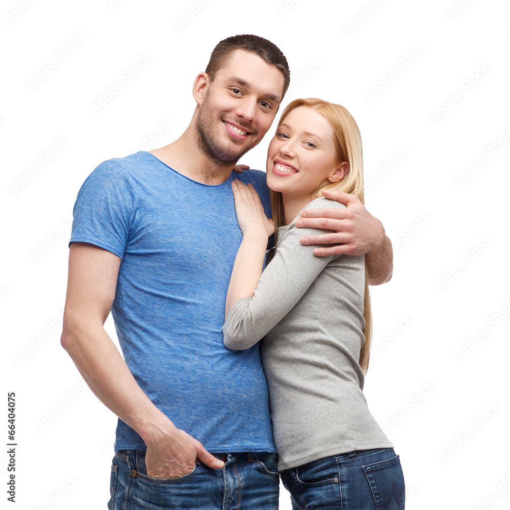 smiling couple hugging smiling couple hugging