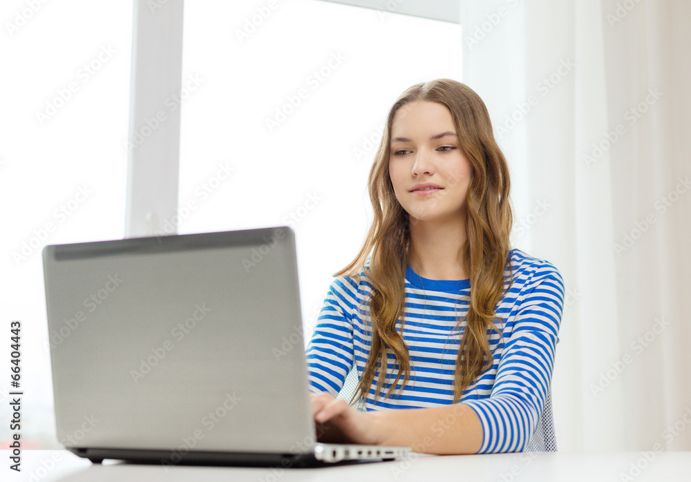 smiling teenage gitl with laptop computer at home smiling teenage gitl with laptop computer at home
