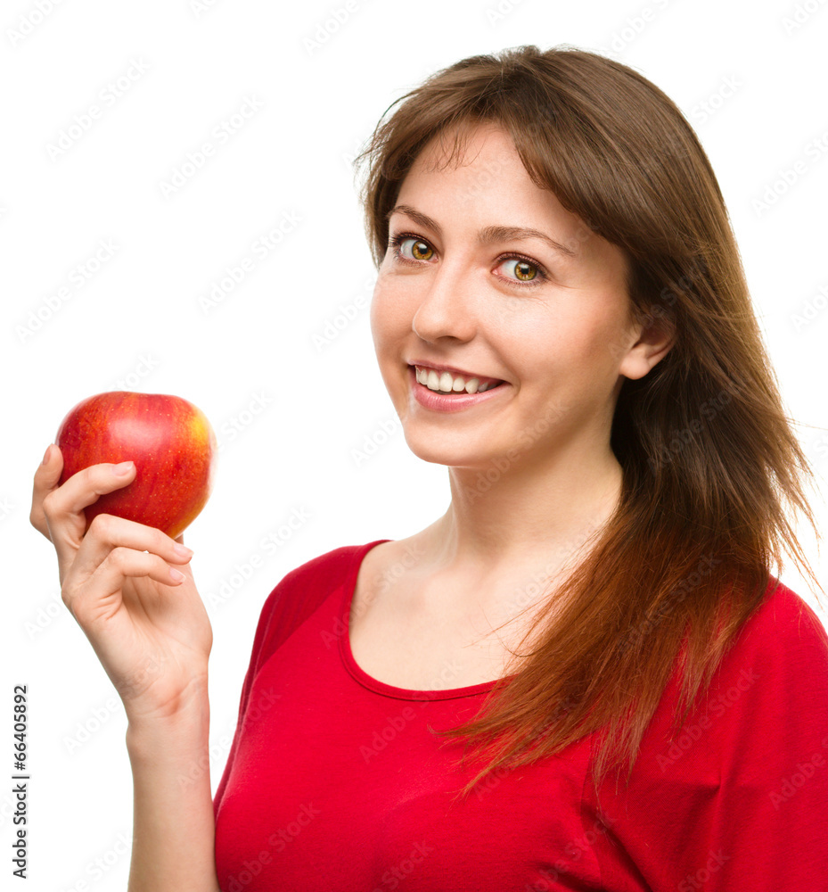 Young happy girl with apple Young happy girl with apple