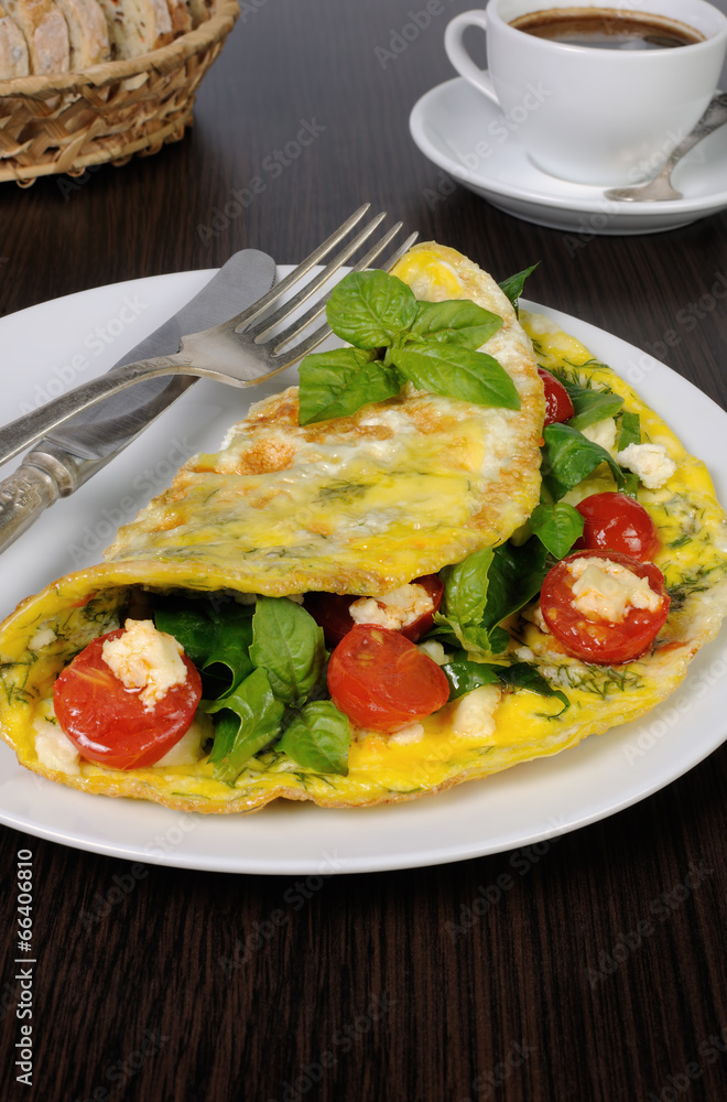 Omelet with spinach, basil, cherry tomatoes and cheese Adyg