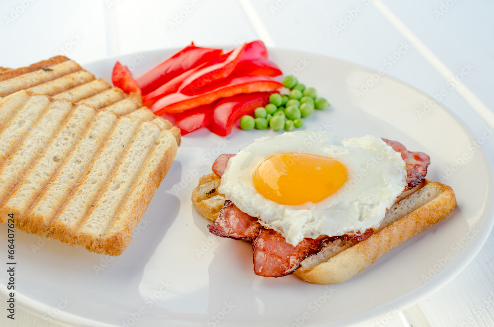Fresh breakfest - ham, eggs, vegetable and toast Fresh breakfest - ham, eggs, vegetable and toast