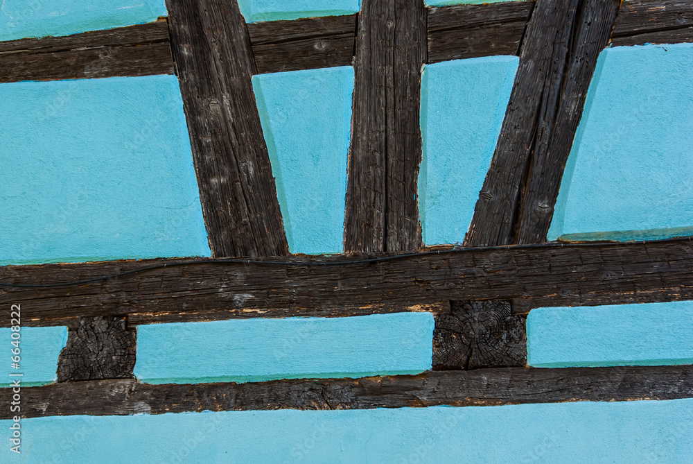 Wall of turquoise half timbered building in France. Wall of turquoise half timbered building in France.