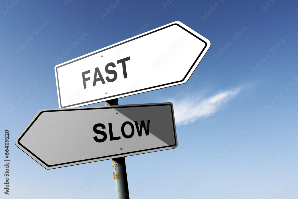 Fast and Slow directions. Opposite traffic sign. Fast and Slow directions. Opposite traffic sign.