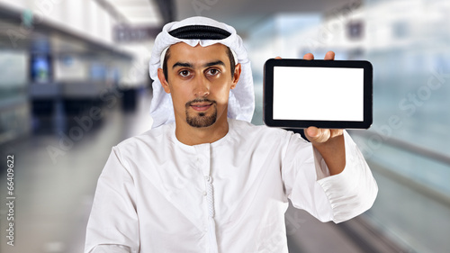 Man using digital tablet photo