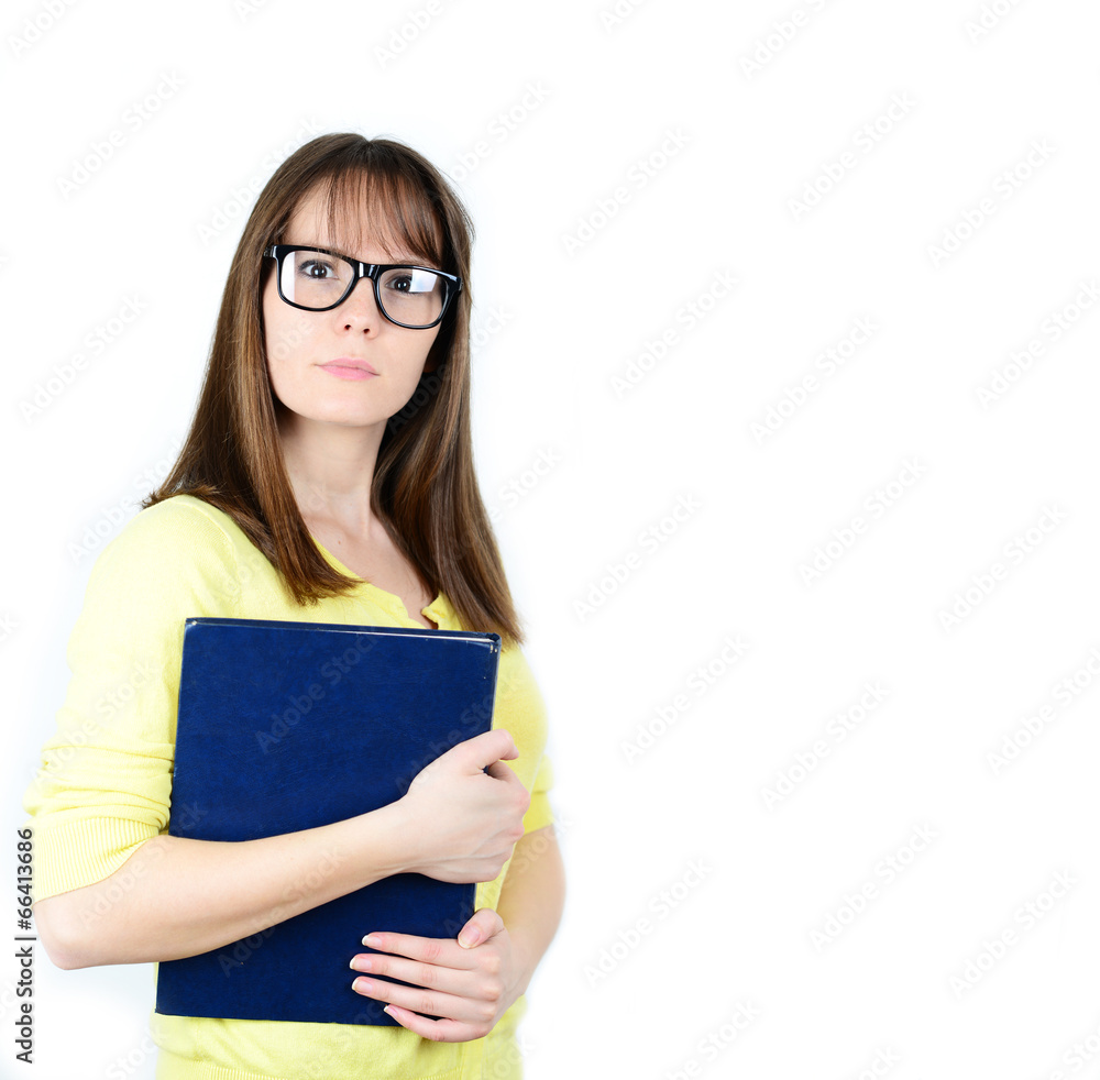 Happy young student women holding books in her hand while standi Happy young student women holding books in her hand while standi