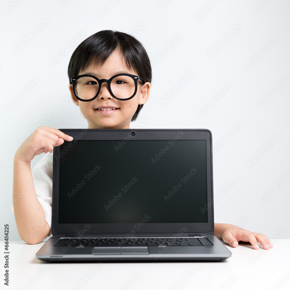 Little school girl with laptop Little school girl with laptop