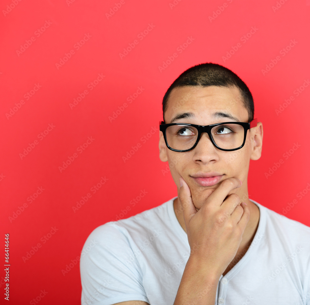 Portrait of a funny businessman with fingers on chin while think Portrait of a funny businessman with fingers on chin while think