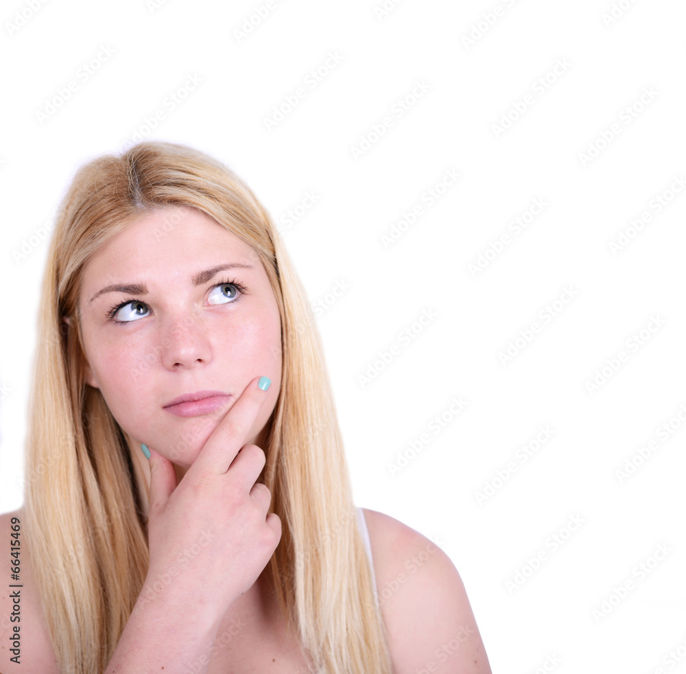 Portrait of beautiful girl thinking and looking up against white Portrait of beautiful girl thinking and looking up against white