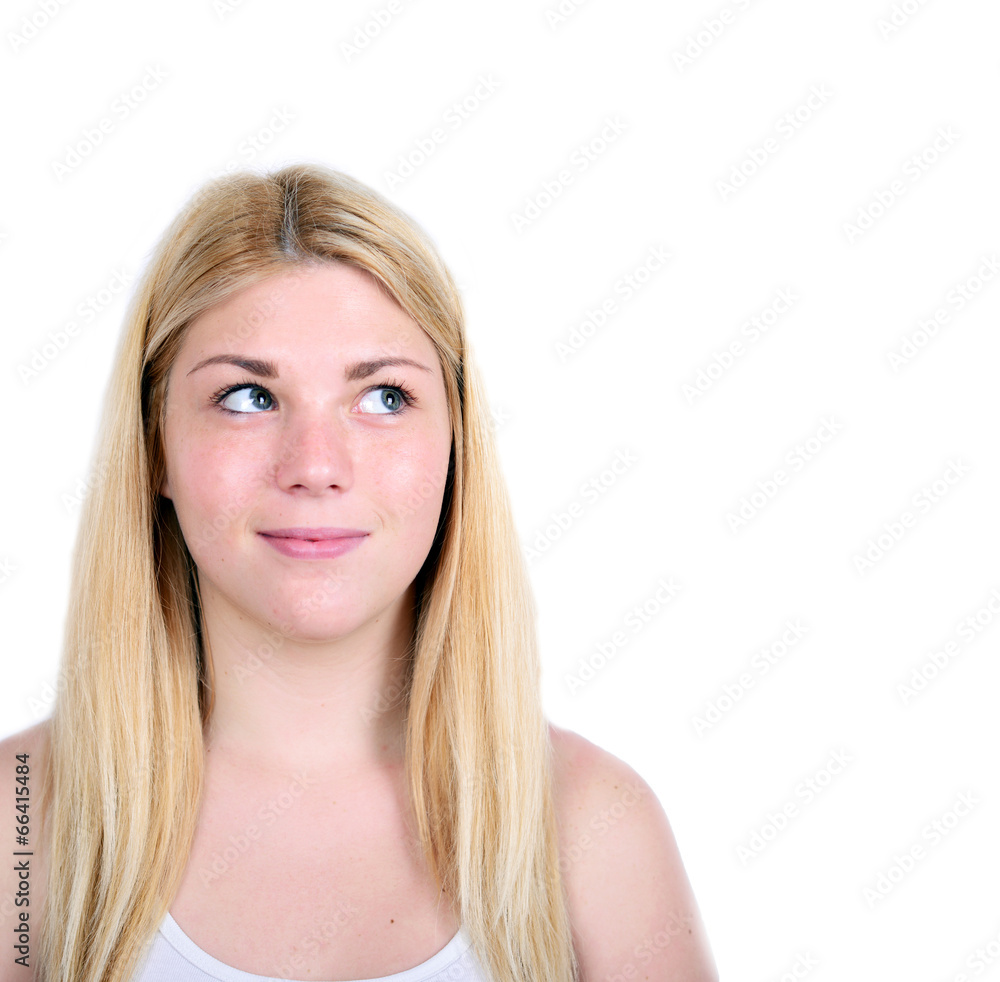 Portrait of beautiful girl thinking and looking up against white Portrait of beautiful girl thinking and looking up against white