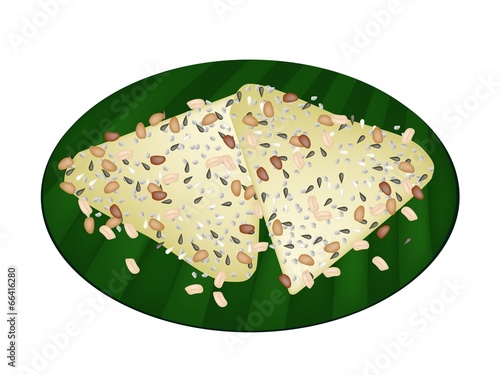 Thai Coconut Pancake on Banana Leaf Container photo