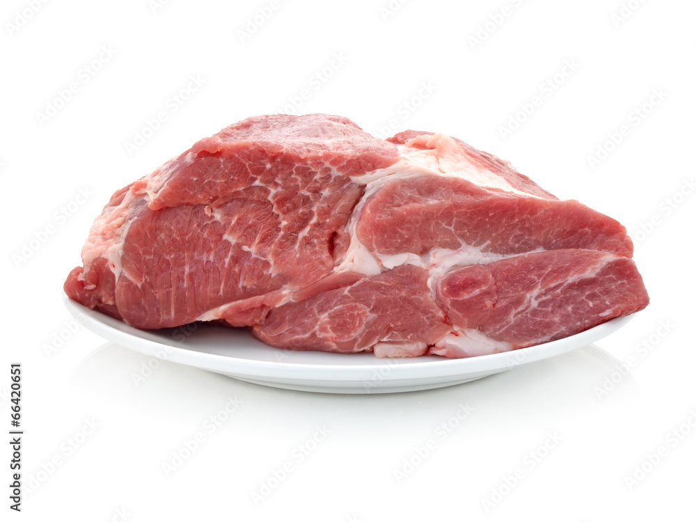 Raw pork dish isolated on a white background.