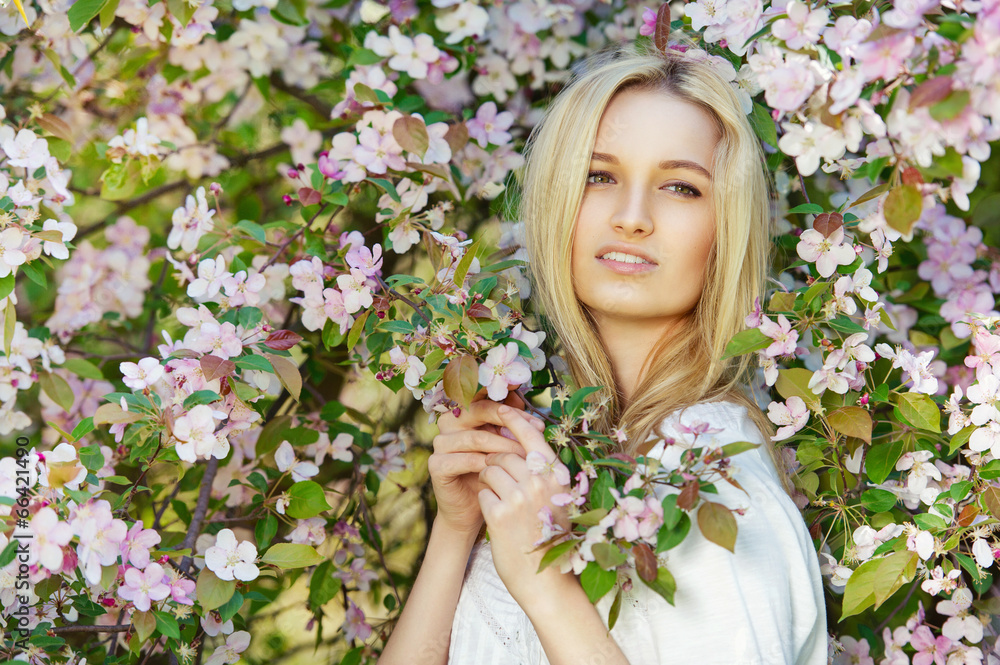 Portrait of gorgeous spring girl in blooming apple tree Portrait of gorgeous spring girl in blooming apple tree