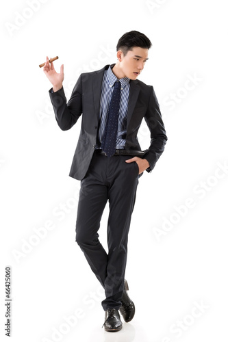 businessman holding a cigar